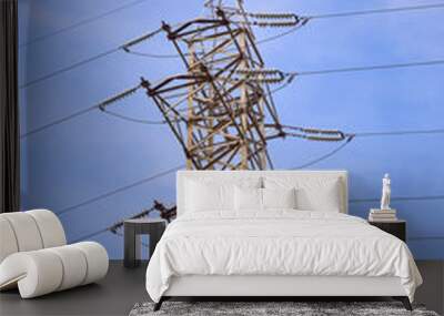 High-voltage pole against the blue sky. Wall mural