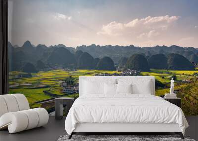 Rapeseed flower field and villages at Wanfenglin  National Geological Park (Forest of Ten Thousands Peaks), China Wall mural