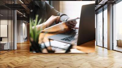 close up a accountant working about financial at office to calculate expenses, accounting concept Wall mural