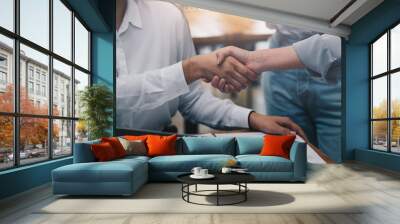 Close up of Business people shaking hands, finishing up meeting, business etiquette, congratulation, merger and acquisition concept Wall mural