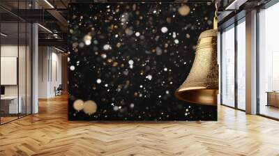 A gold bell is suspended in the air above a snowy background Wall mural