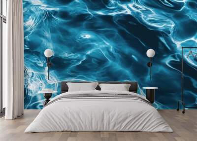 Vibrant turquoise water with intricate patterns creating an inviting and serene atmosphere. Wall mural