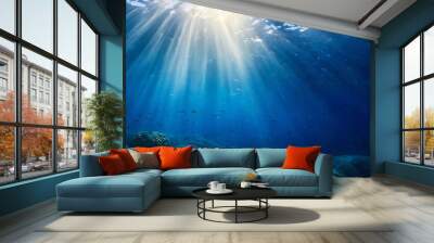 abstract image of tropical underwater dark blue deep ocean wide nature background with rays of sunlight Wall mural