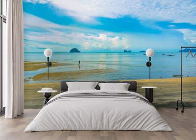 Beautiful beach with clear blue water and blue sky with clouds at Langkawi island Wall mural