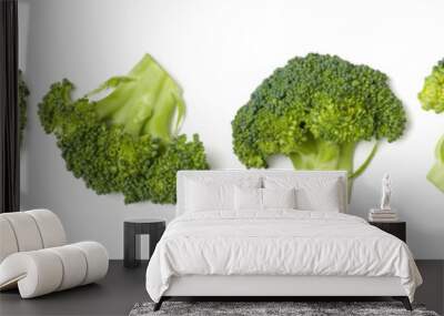 Creative layout made of broccoli. Flat lay, top view. Vegetables isolated on white background. Food ingredient pattern. Banner.. Wall mural