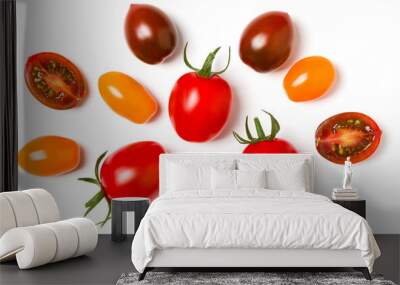 various colorful tomatoes isolated on white background. Top view, flat lay. Creative layout. Wall mural