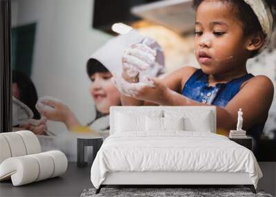 Group diversity kids girl making cake bakery in kitchen Wall mural