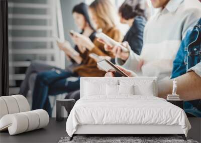 group of young teen using smart phone for internet online with happy feeling Wall mural