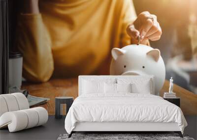 hand put money coin into piggy for saving money wealth Wall mural