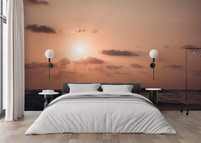 Beautiful sunset above sea. Wall mural