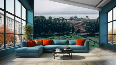 The beautiful Garden is visible next to the sea. natural beauty Wall mural