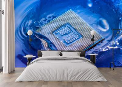 technology cyber electronic concept. cpu ram computer Fall into the water on blue light background. CPU cooling with water Wall mural