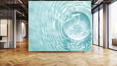 Gentle ripples in turquoise water, a clear glass bowl reflecting light, smooth white stones resting nearby, creating a serene and tranquil atmosphere. Wall mural