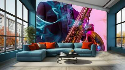 A saxophonist immersed in a solo performance against a soft light solid color backdrop, exuding emotion and creativity Wall mural