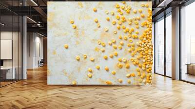 A delicate wallpaper featuring tiny corn kernels in various shades of yellow scattered across a light textured surface Wall mural