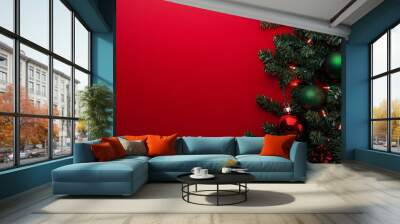 A red background with green Christmas tree ornaments and lights creating a festive and cheerful vibe Wall mural