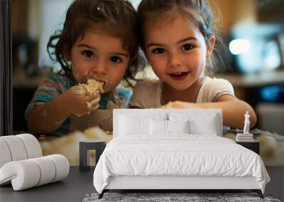 Children sneaking a taste of cookie dough while baking Wall mural