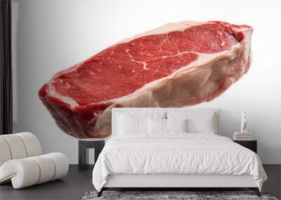 A piece of meat is shown on a white background Wall mural