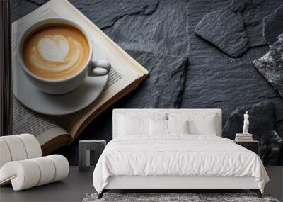 Classes and newspaper and cup of coffee on black stone background Wall mural