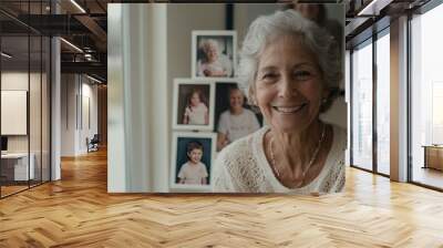 Joyful moments a cherished elderly woman smiles amidst family memories captured in photographs emphasizing the beauty of aging and connection Wall mural