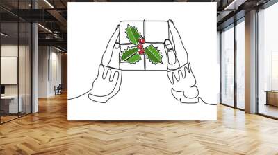 Continuous line drawing of hand holding gift box with ribbon. Single one line art of birthday surprise and christmas box. Vector illustration Wall mural