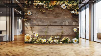 A whimsical floral background featuring a mix of daisies and sunflowers on a rustic wooden surface Wall mural