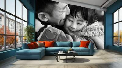 black and white photo of a father and daughter hugging Wall mural