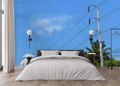 Large electric pole with blue sky Wall mural