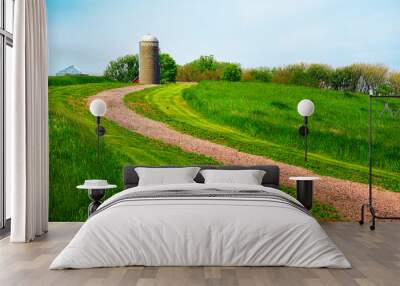 Tranquil farmland summer landscape on the green hill: The beauty of midwestern prairie in Hartford, Minnehaha County, South Dakota Wall mural