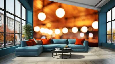 blur orange light of party at pub or bar at night background Wall mural