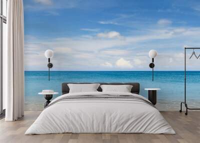 Sand beach and blue ocean Wall mural