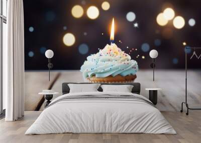 Delicious birthday cupcake with a lit candle on a rustic wooden table, perfect for celebrating special occasions and capturing festive moments


 Wall mural