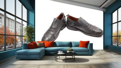 Two funny old black shoes isolated on white background Wall mural