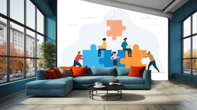 Vector illustration of Teamwork concept. Team people working together with giant puzzle elements. Wall mural