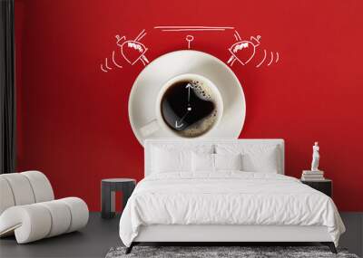 Clock. Cup of fresh espresso with clock sign on red background Wall mural