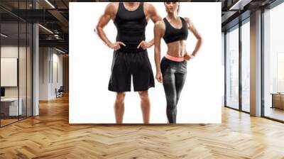 Sport, fitness, workout concept. Fit couple, strong muscular man and slim woman posing on a white background Wall mural