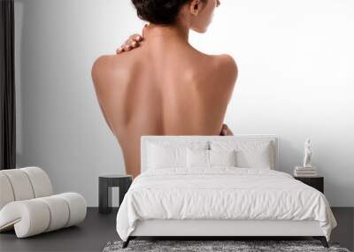 Young beauty nude women back, isolated on white. Wall mural