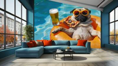 A pug dog is lying on an inflatable ring and eating a slice of pizza with beer in a swimming pool. Wall mural