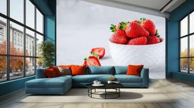 Fresh ripe delicious strawberry in a white bowl on a grey stone background Wall mural