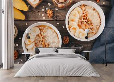 healthy breakfast bowl. oatmeal with banana, walnuts, chia seeds and honey Wall mural