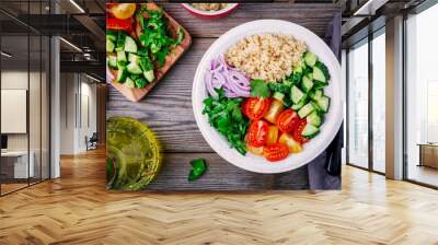 Healthy Quinoa Tabbouleh Salad bowl with fresh cucumbers, tomatoes and red onions Wall mural