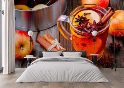 Hot mulled apple cider with with cinnamon sticks, cloves and anise Wall mural