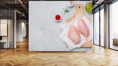 Raw chicken breast fillets with rosemary, red paprika and spices Wall mural