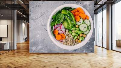 Vegan Buddha bowl salad with spinach, quinoa, roasted chickpeas, grilled chicken, avocado, edamame beans, cucumbers, sesame and pumpkin seeds. Wall mural