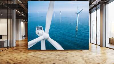 Wind turbine close-up. Aerial view of wind turbines or windmills farm field in blue sea in Finland. Alternative energy. Wall mural