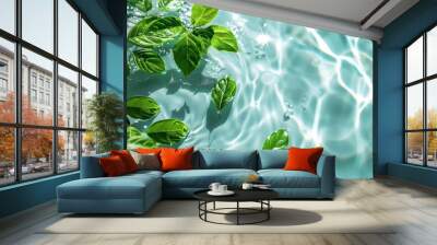 Spa Product Green leaves show clear water on a light background. Summer concept, flat lay, top view. background for the display of natural cosmetics. Nature background for luxury product placement Wall mural