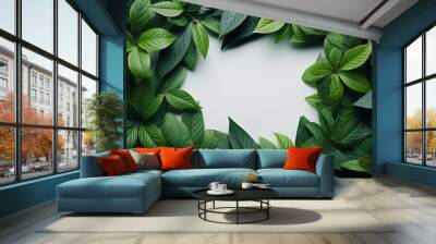 The composition is composed of a frame of juicy green leaves with a beautiful texture and a note on a paper card. Flat lay. Nature concept, copy space. Wall mural