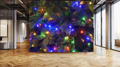 Close up on Christmas tree with colorful light Wall mural