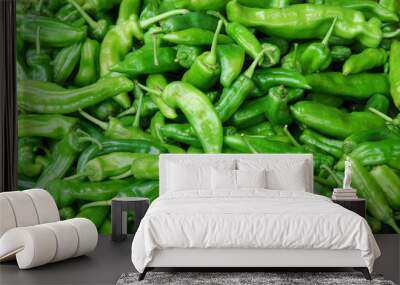 Fresh green pepper pile in harvest season Wall mural