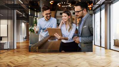 Beautiful business colleagues at meeting in modern office interior Wall mural